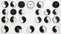 contemporary yin yang clocks