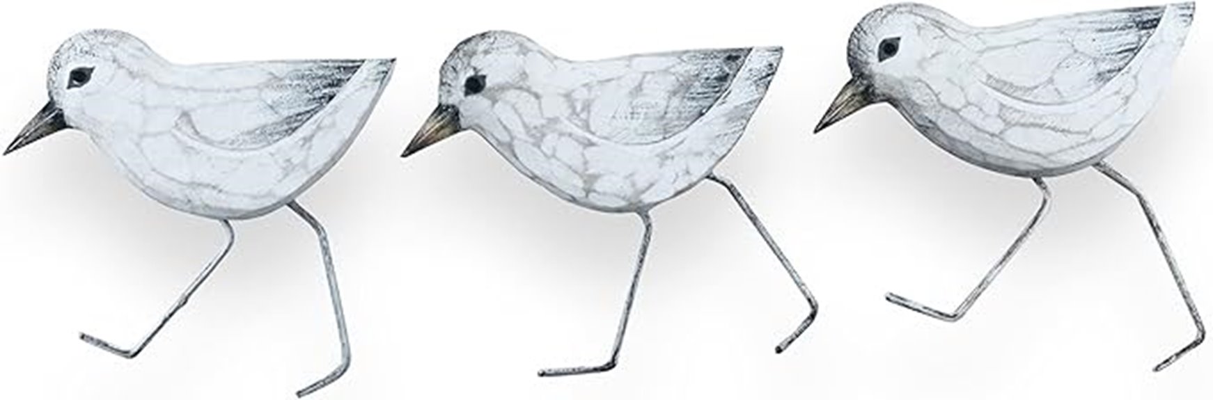 three sandpiper figurines