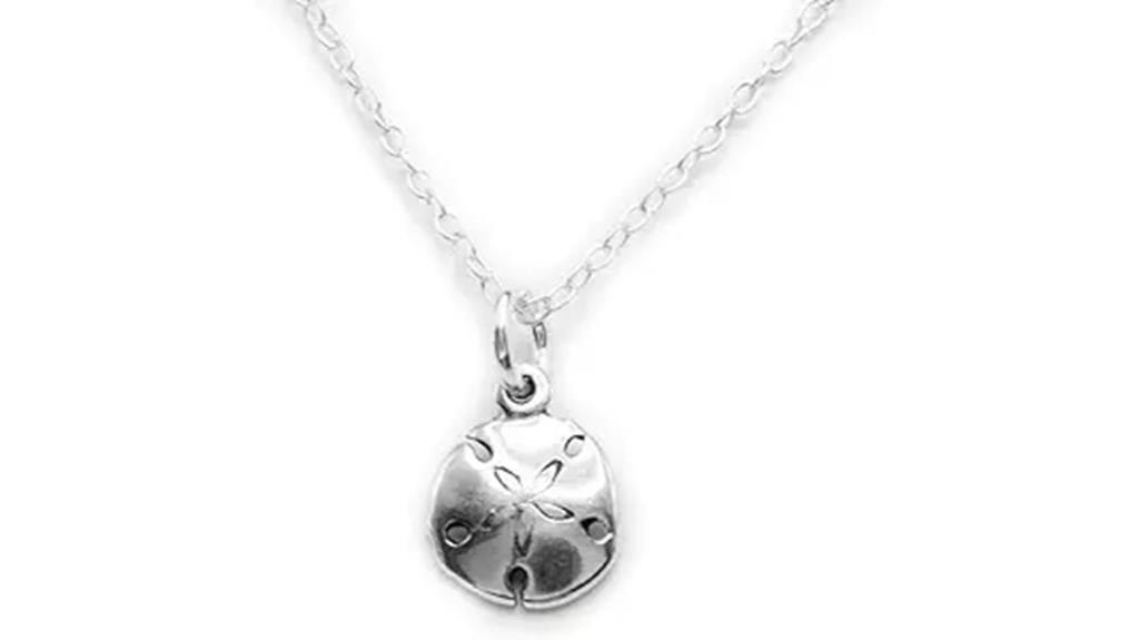 tiny silver sand dollar