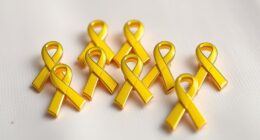 top yellow ribbon pins
